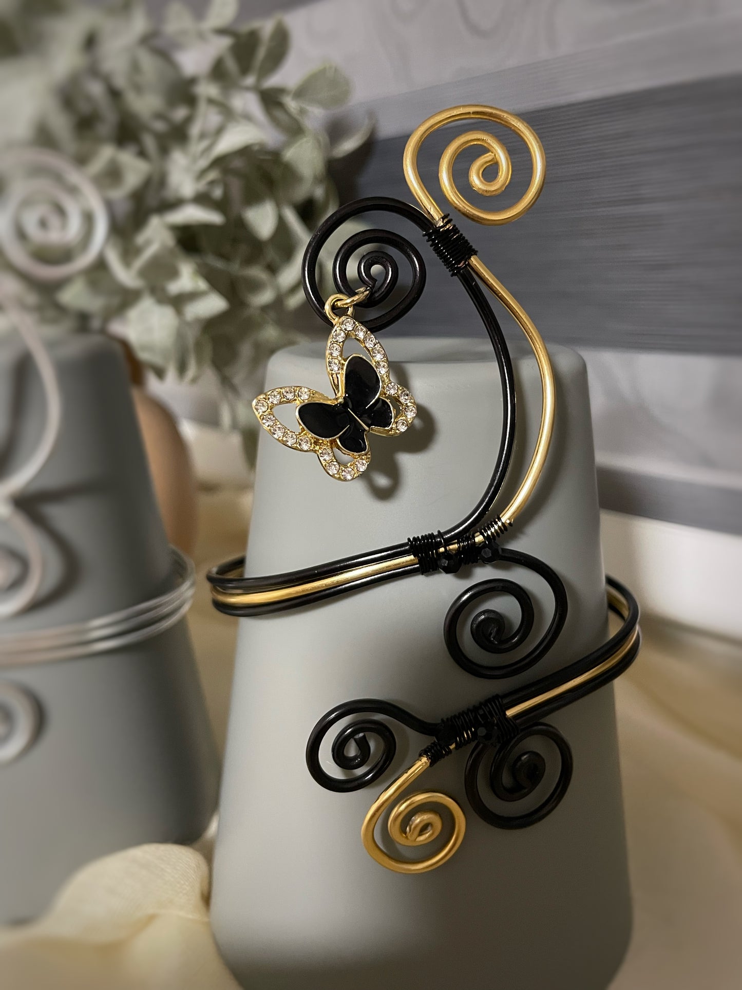 Black & Gold Sculpted Aluminum Arm Cuff with Butterfly Charm